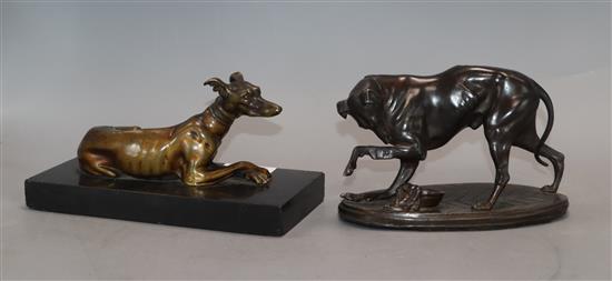 A 19th century bronze figure of a recumbent greyhound and a spelter figure of a greyhound